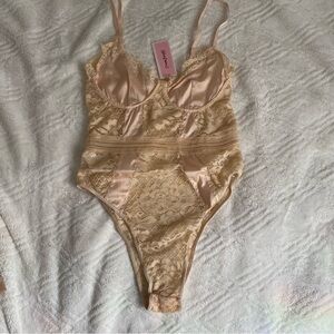 NWT Dream bandit. Lace body Suit. Small